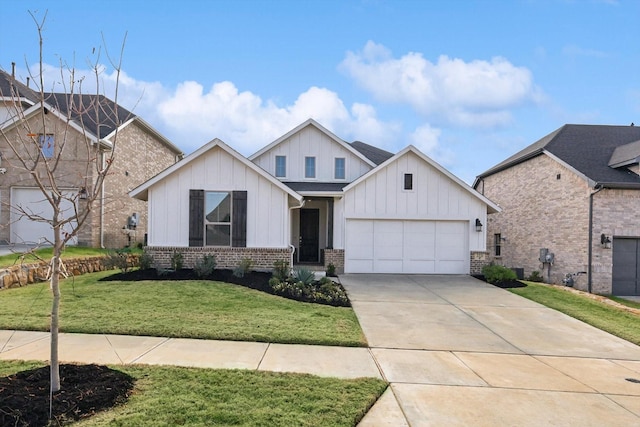 view of front of house featuring a garage and a front lawn