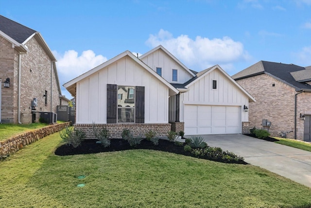 view of front facade with a garage and a front lawn