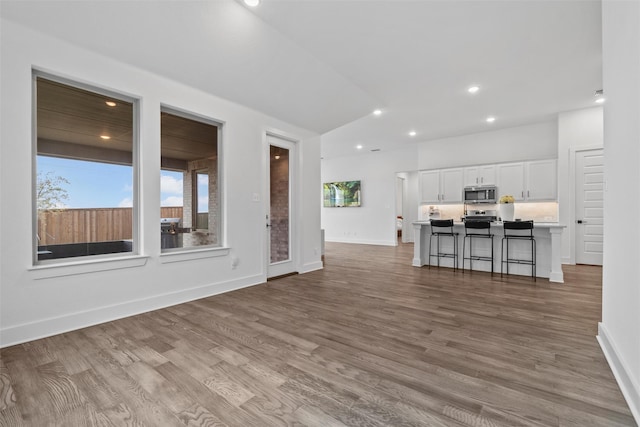 unfurnished living room featuring light hardwood / wood-style flooring