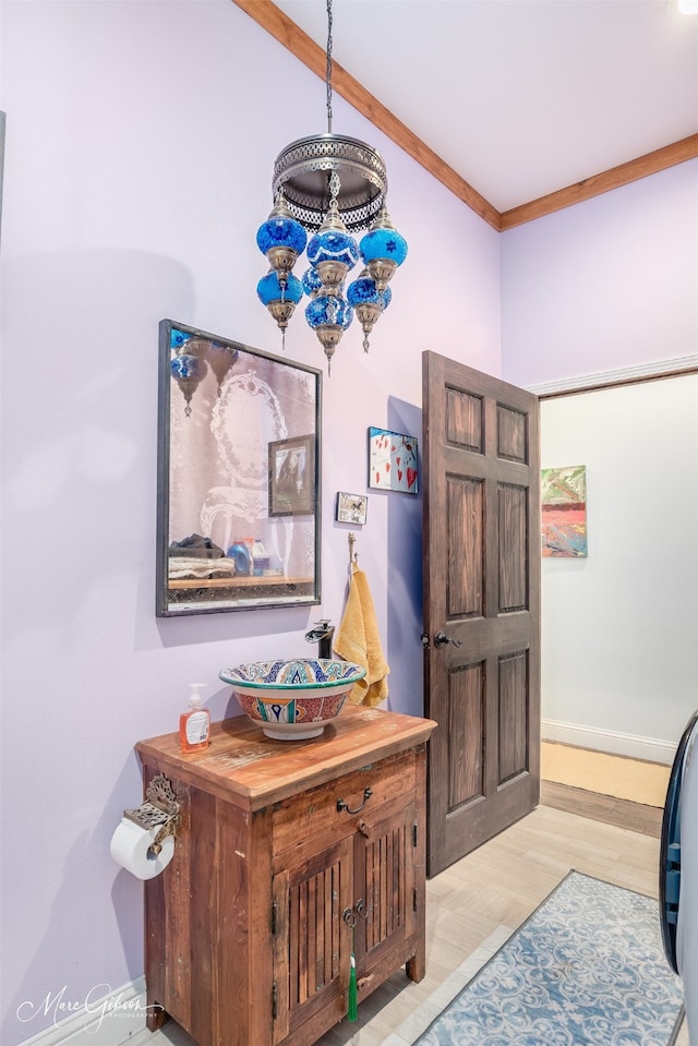 interior space featuring crown molding and hardwood / wood-style floors