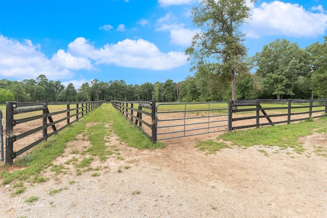 view of gate featuring a rural view