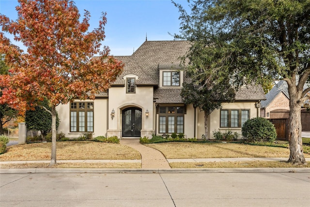 french provincial home with french doors