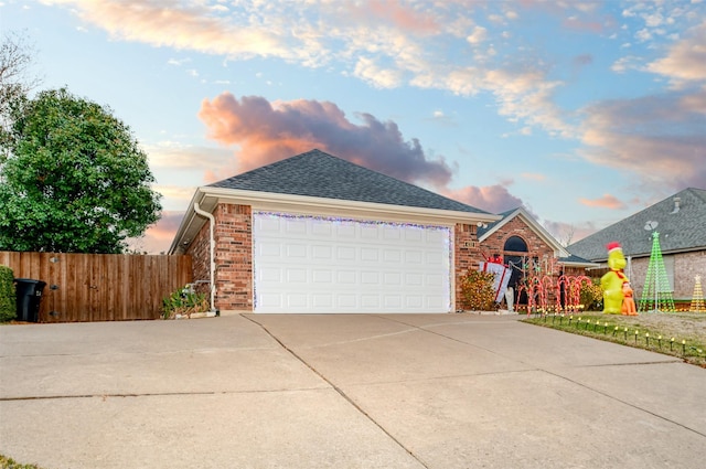 view of front of property featuring a garage