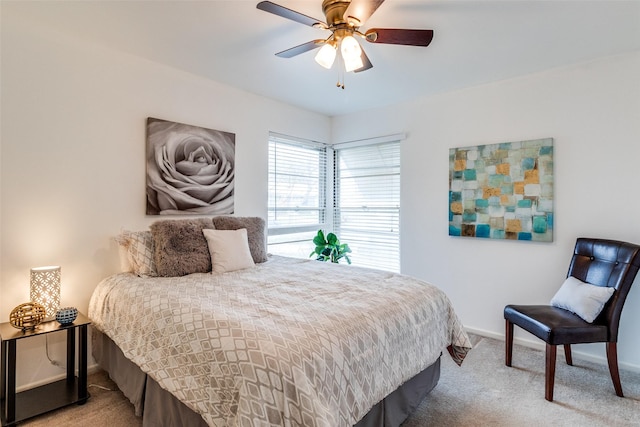 bedroom with ceiling fan and carpet floors