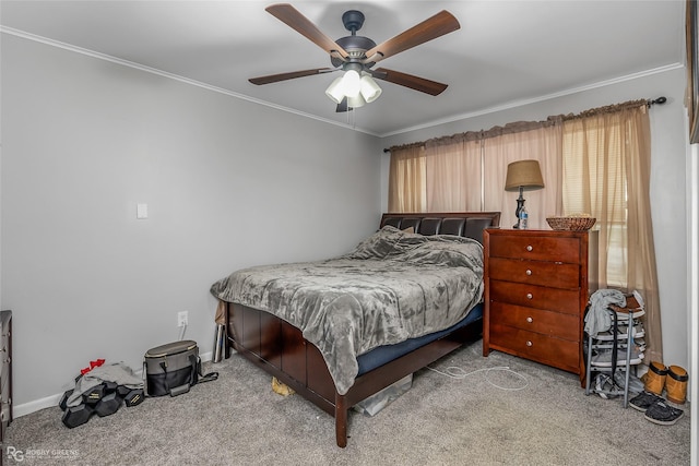 bedroom with ceiling fan, light colored carpet, and crown molding