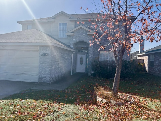 view of front property with a garage