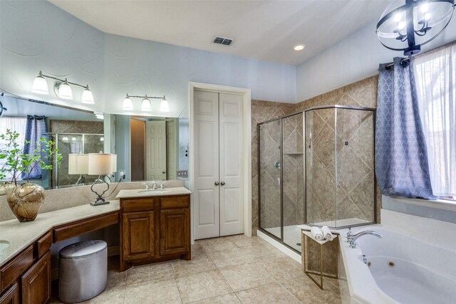 carpeted bedroom with ensuite bathroom and vaulted ceiling