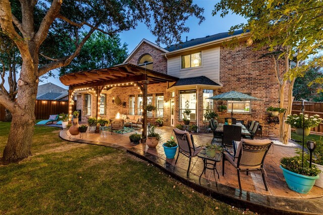 view of patio / terrace featuring a pergola and an outdoor hangout area