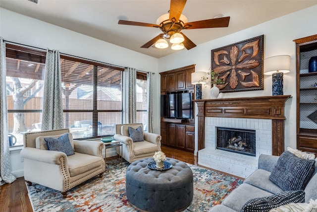 dining space with hardwood / wood-style floors, ornamental molding, plenty of natural light, and an inviting chandelier