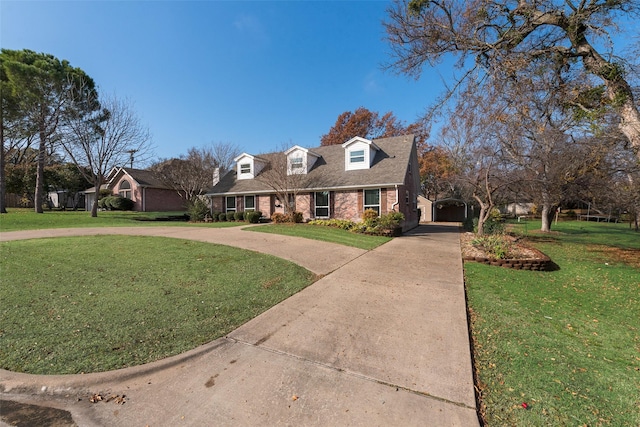 cape cod home featuring a front lawn