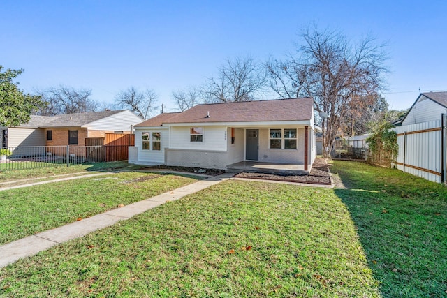 ranch-style house featuring a front lawn