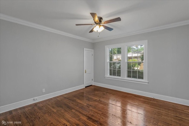 unfurnished room featuring dark hardwood / wood-style flooring, ceiling fan, and crown molding