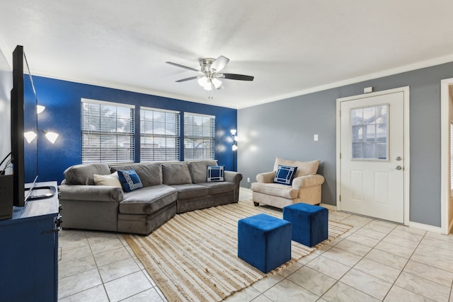 living room featuring ceiling fan and crown molding