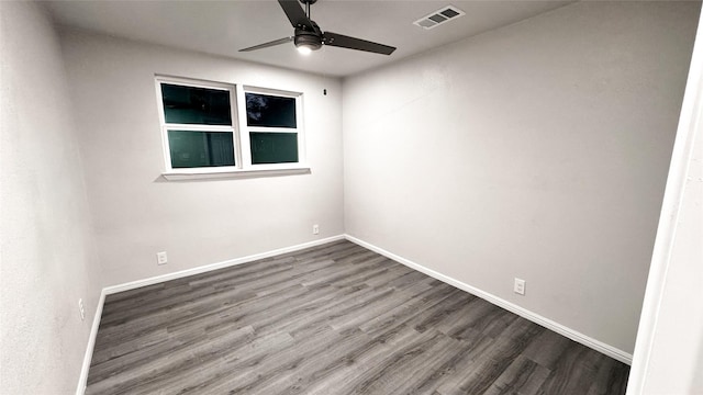 unfurnished room featuring hardwood / wood-style flooring and ceiling fan