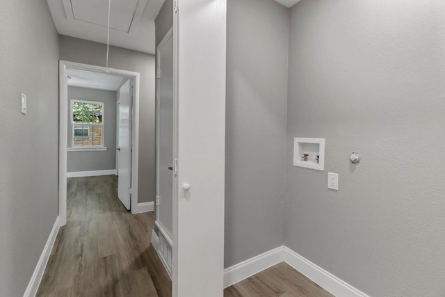 laundry room with hardwood / wood-style floors, hookup for a washing machine, and gas dryer hookup