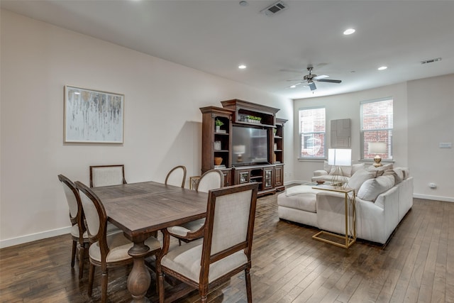 dining area featuring dark hardwood / wood-style floors and ceiling fan