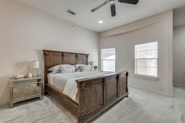 bedroom featuring ceiling fan and light colored carpet