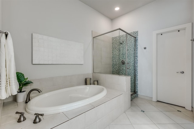 bathroom featuring tile patterned floors and plus walk in shower