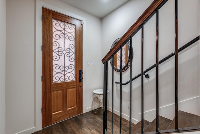 foyer with dark wood-type flooring