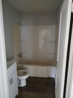 full bathroom featuring hardwood / wood-style flooring, vanity, tub / shower combination, and toilet