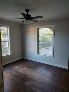 unfurnished room with crown molding, ceiling fan, and dark hardwood / wood-style floors