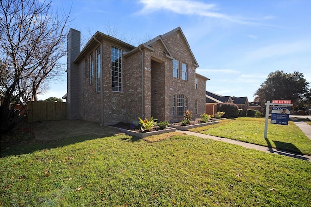 view of property exterior featuring a lawn