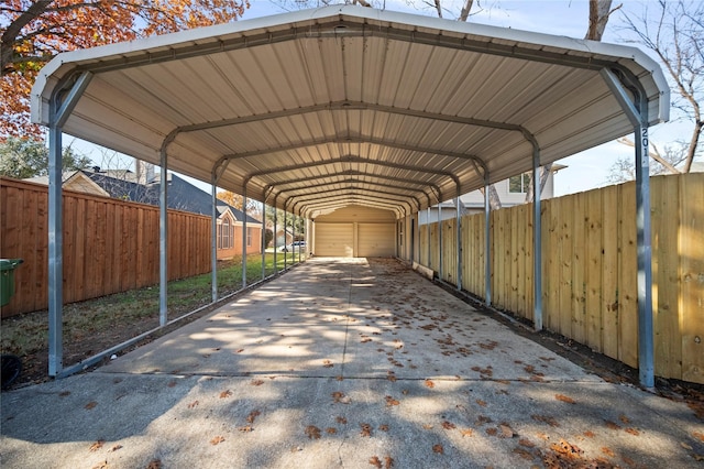 view of vehicle parking with a carport