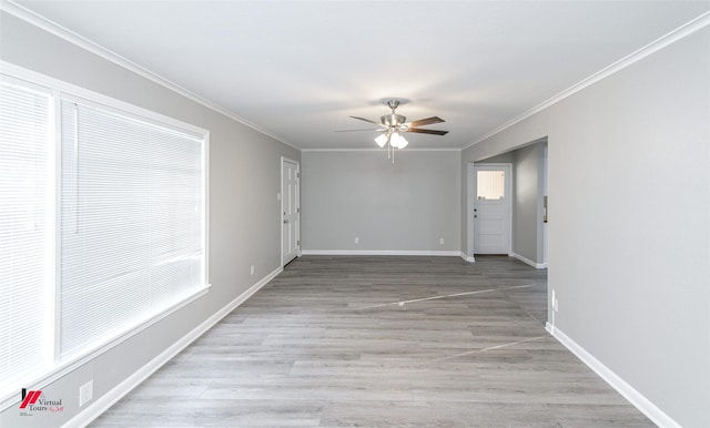 spare room with light hardwood / wood-style floors, ceiling fan, and ornamental molding