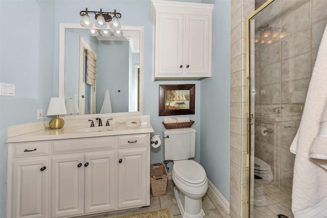 bathroom featuring walk in shower, tile patterned floors, toilet, and vanity