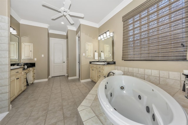 bathroom with tile patterned flooring, vanity, ornamental molding, a relaxing tiled tub, and ceiling fan