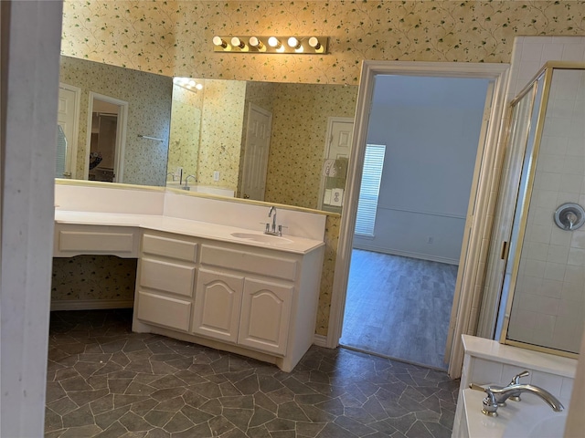 bathroom with hardwood / wood-style flooring, vanity, and shower with separate bathtub