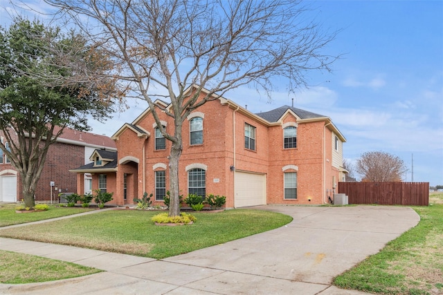 view of front facade with central AC unit, a garage, and a front lawn