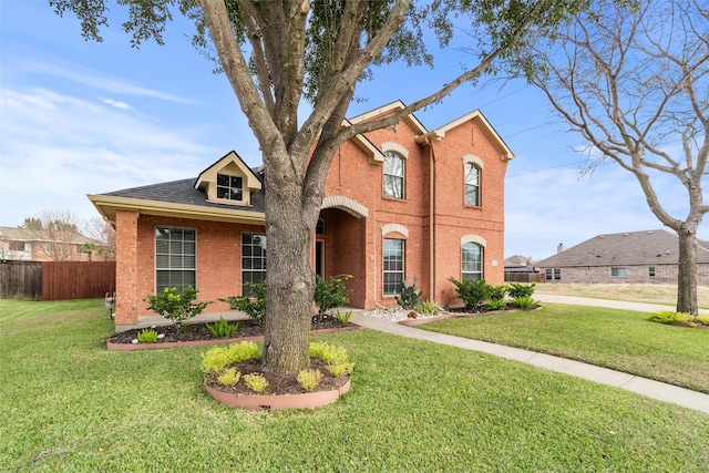 front of property featuring a front lawn