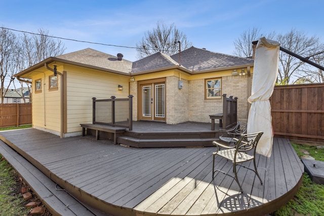 wooden terrace featuring french doors