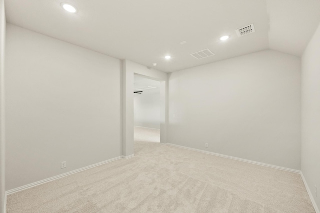 unfurnished room featuring recessed lighting, visible vents, baseboards, and carpet floors