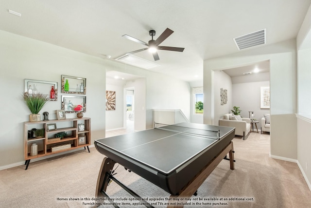 recreation room with light colored carpet and ceiling fan