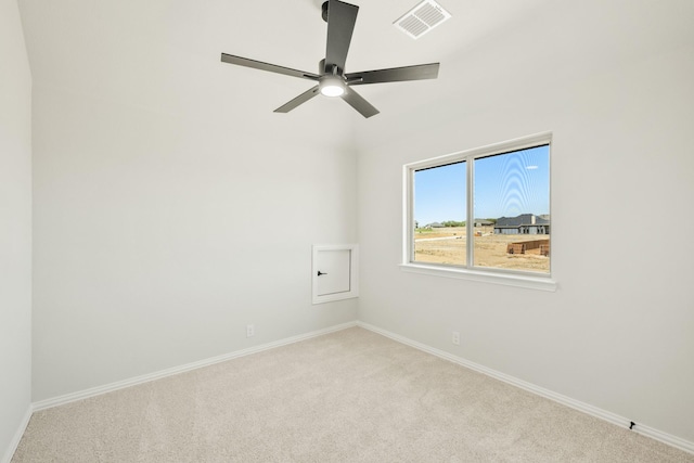 unfurnished room featuring ceiling fan, visible vents, baseboards, and carpet floors
