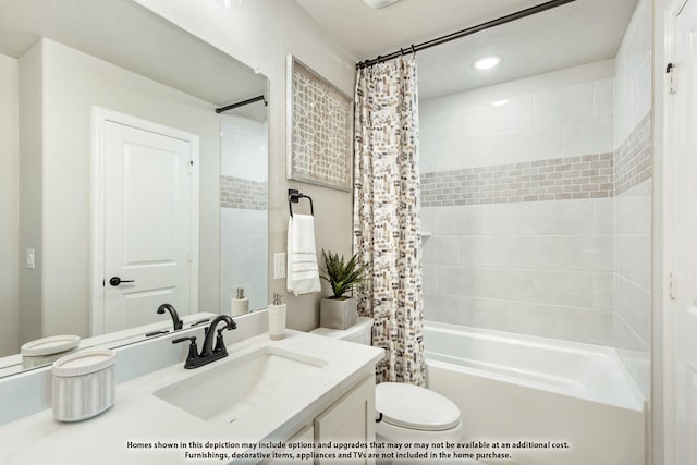 full bathroom featuring vanity, shower / bathtub combination with curtain, and toilet