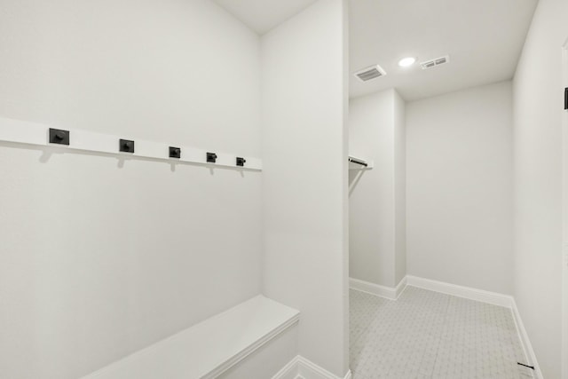 mudroom with recessed lighting, visible vents, and baseboards