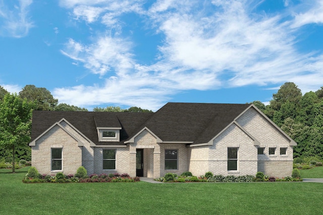 view of front of home with a front yard