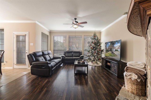 living room with ceiling fan, crown molding, and dark hardwood / wood-style floors