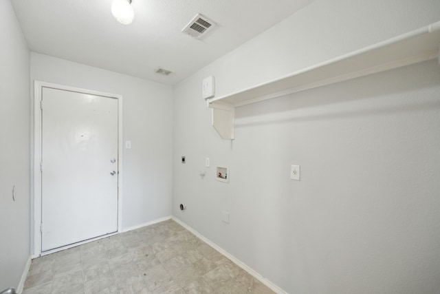 clothes washing area with washer hookup and hookup for an electric dryer