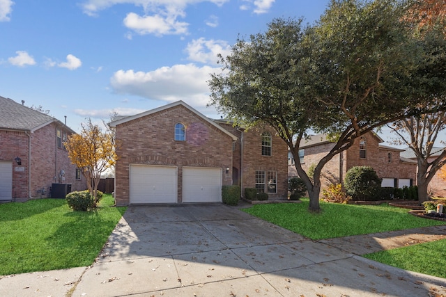 view of property with a garage, a front yard, and cooling unit