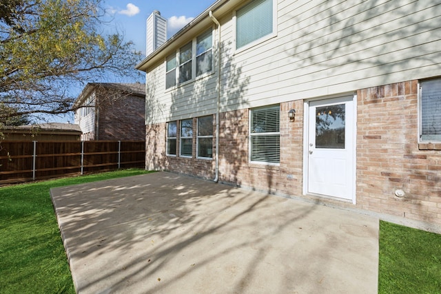 back of house with a patio area