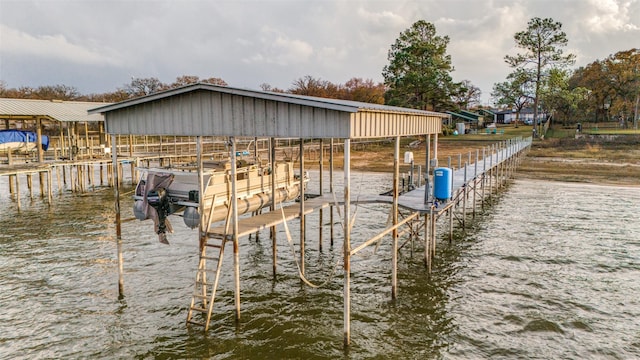 dock area featuring a water view