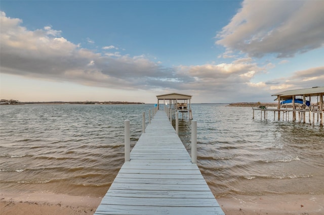 dock area with a water view