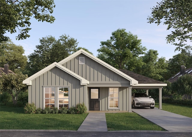 view of front of house with a carport and a front yard