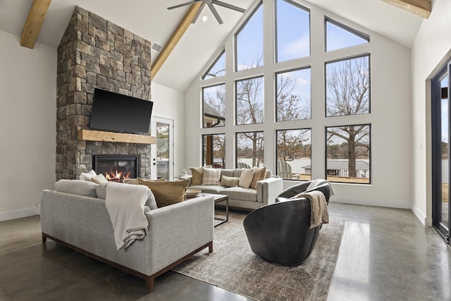 living room featuring beamed ceiling, high vaulted ceiling, a fireplace, and ceiling fan