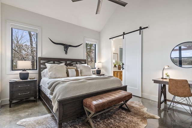 bedroom featuring multiple windows, a barn door, concrete floors, and ceiling fan