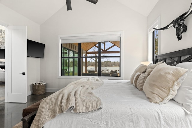 bedroom featuring hardwood / wood-style floors, beamed ceiling, and high vaulted ceiling